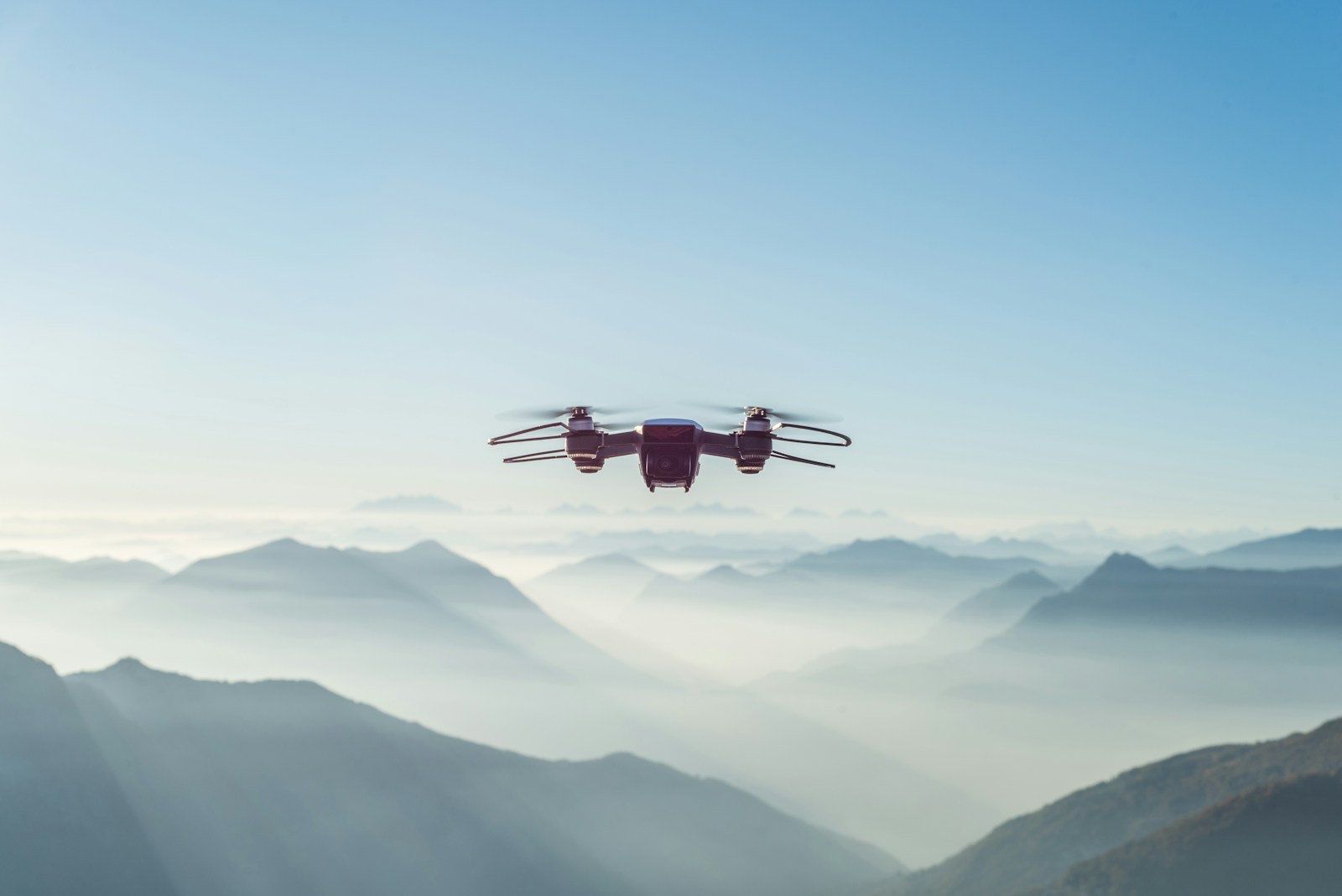 Drone flying at sunset