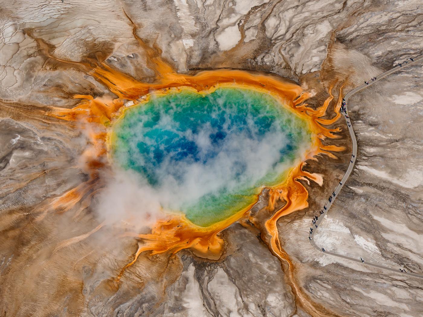 Photographing Grand Prismatic Spring from an Open Door Helicopter