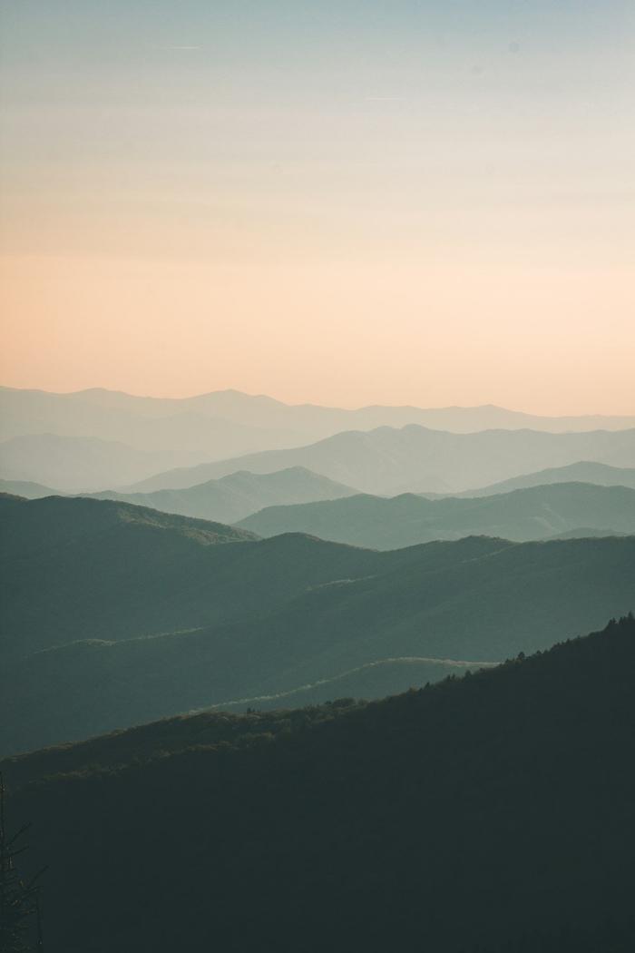 Dramatic mountain landscape at golden hour demonstrating advanced compositional framing techniques