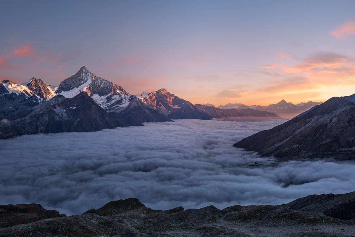 Sweeping mountain valley landscape with fine tonal gradations in clouds and terrain showcasing large sensor rendering