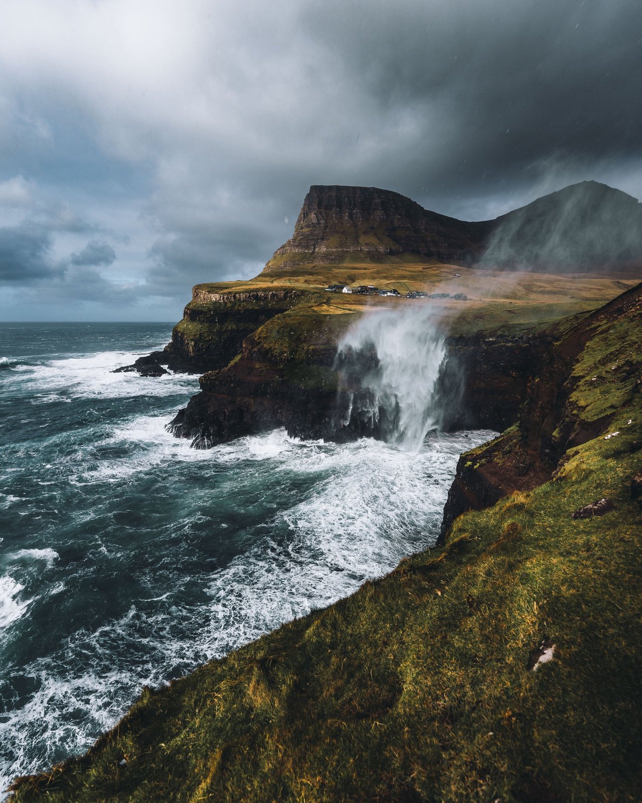 Múlafossur Waterfall aerial view