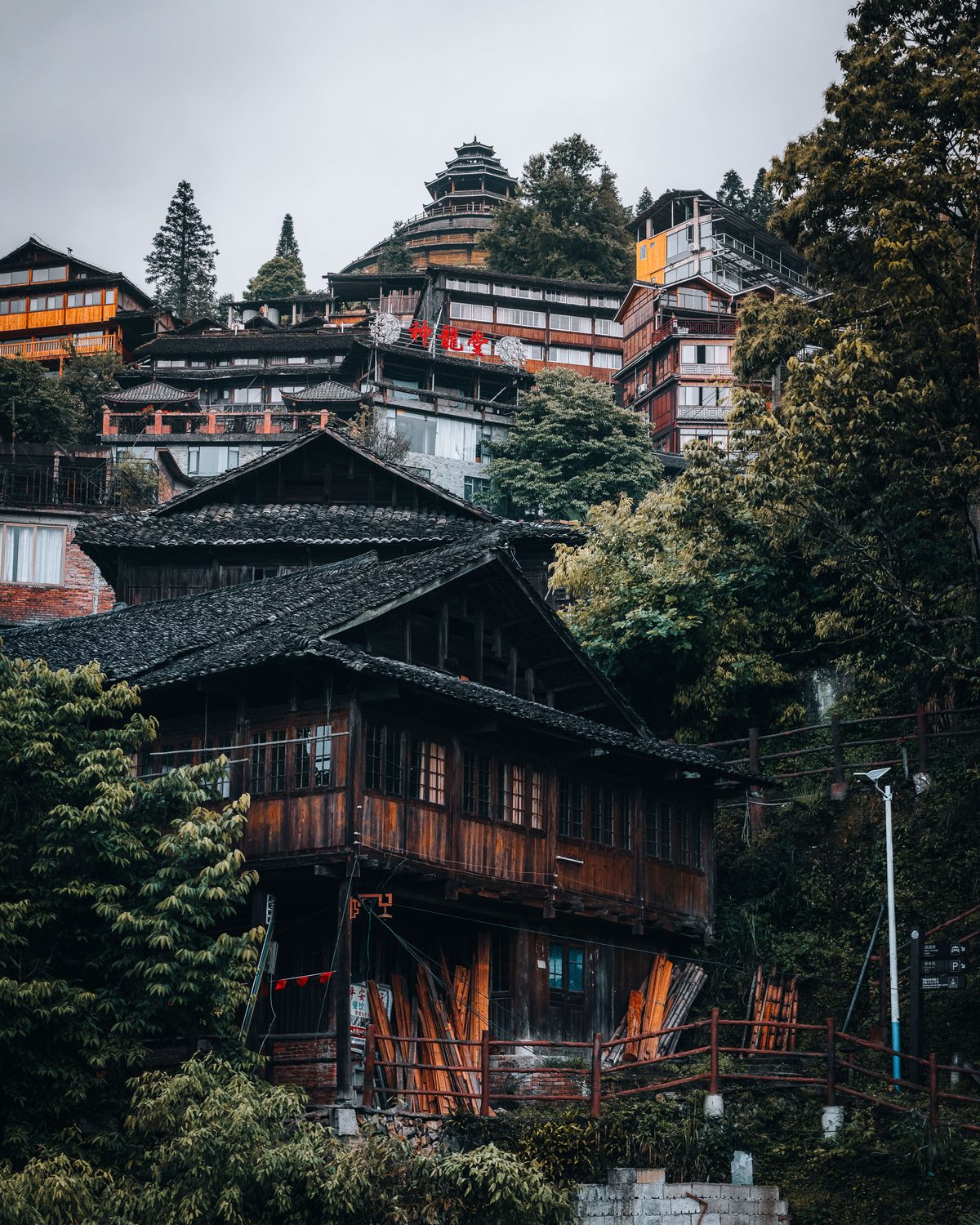Morning mist drifting through karst peaks along the Li River creating layered silhouettes