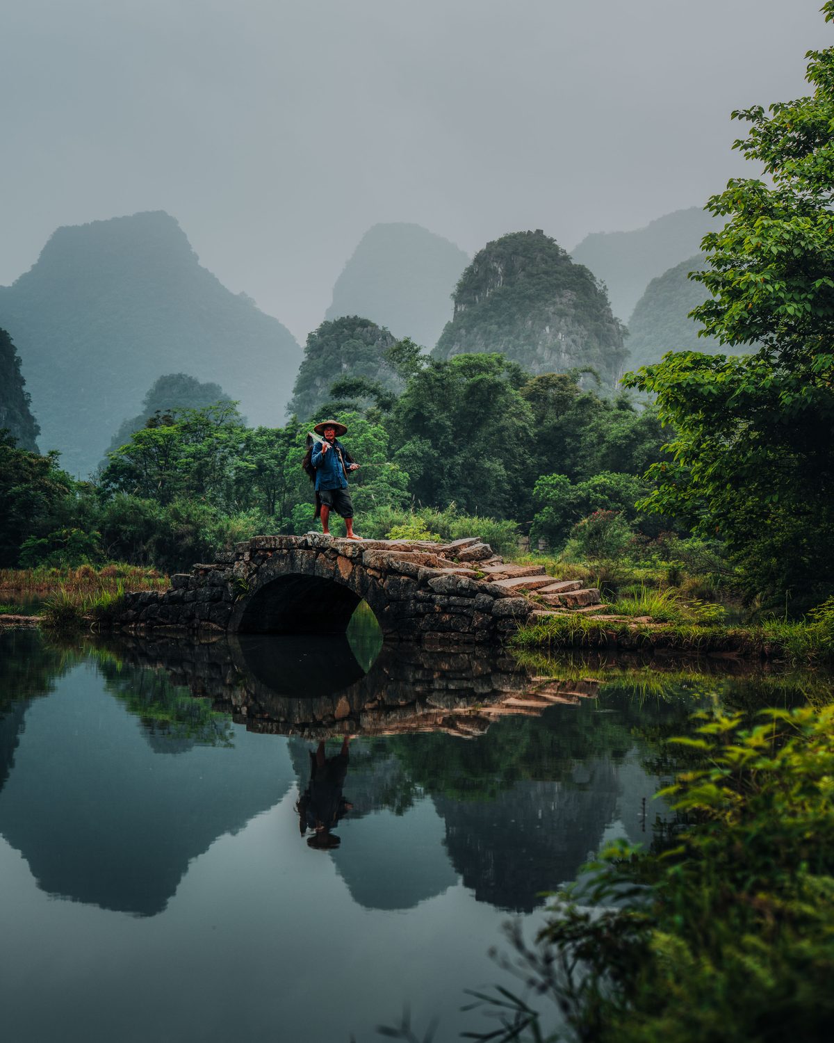 Sunrise view from Xianggong Mountain with karst peaks emerging from river mist